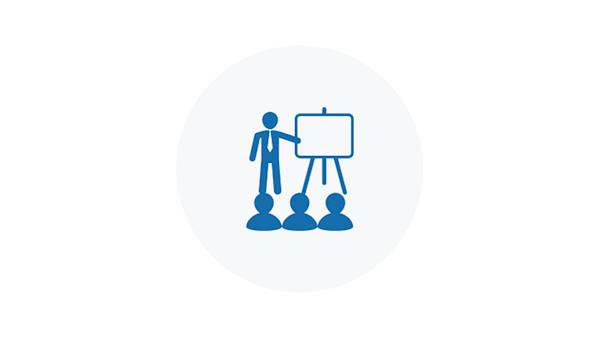 Blue Icon of a Person Presenting to An Audience